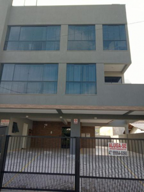 Aconchegante apartamento com churrasqueira em Bombinhas